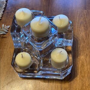 Party lite crystal castle 5 tier candle holder. Weighs over 4 pounds. Like new.